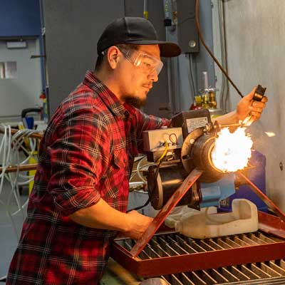 Man firing heat unit 